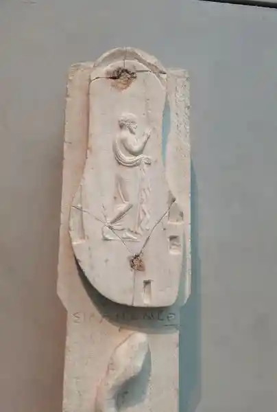 Detail of the Athenian marble stele, man dressed in himation, possibly linked to the cult of the hero on Blaute